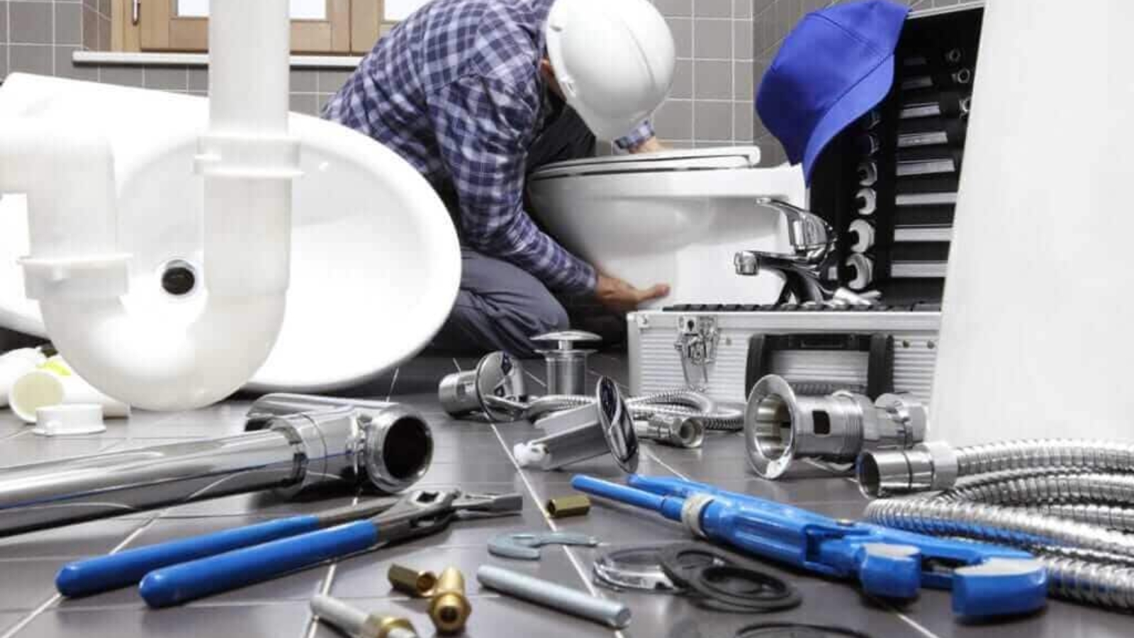 plumber-at-work-in-a-bathroom-1024x683-1